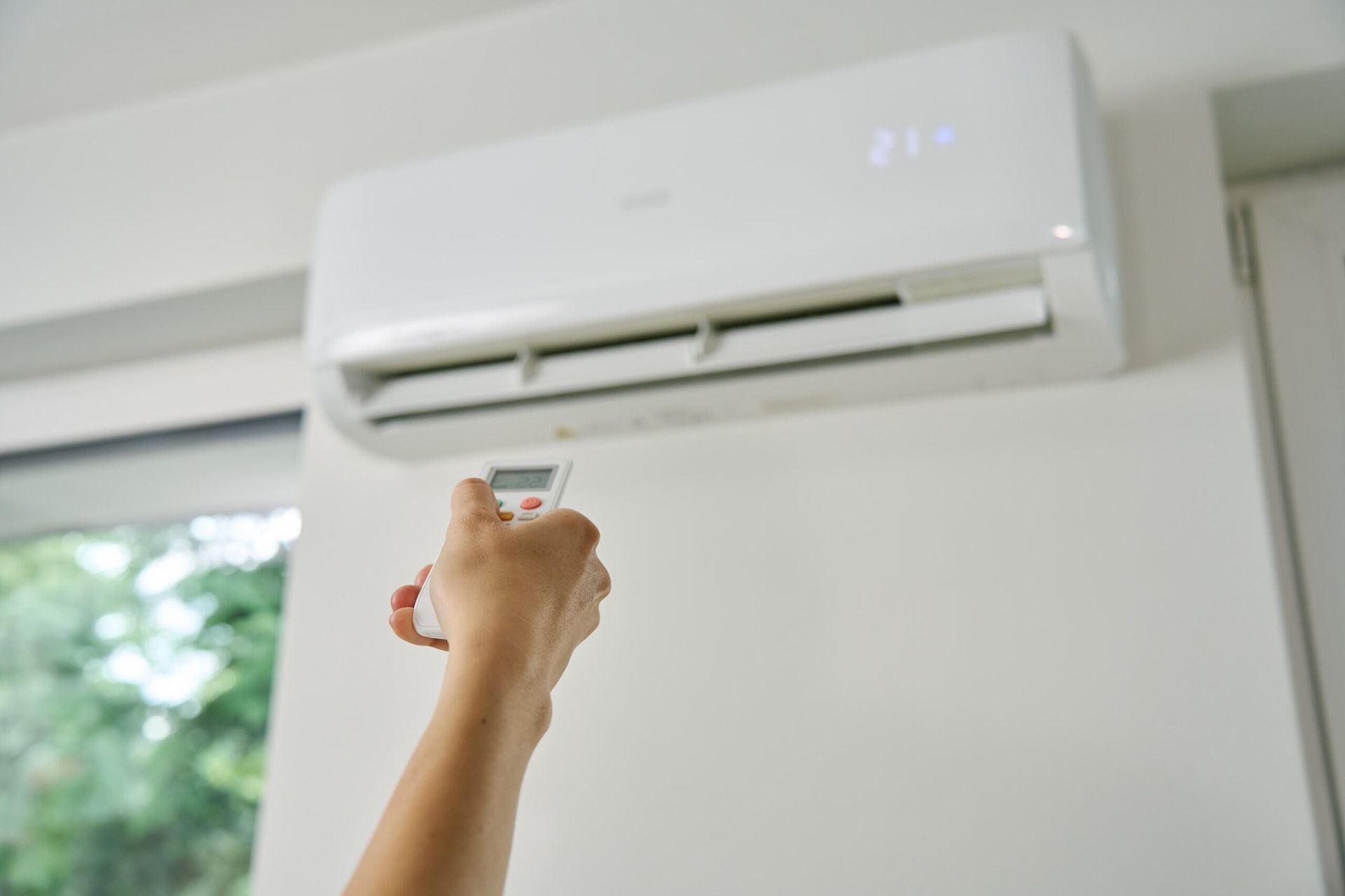 DSMQ technician commissioning an air conditioning system